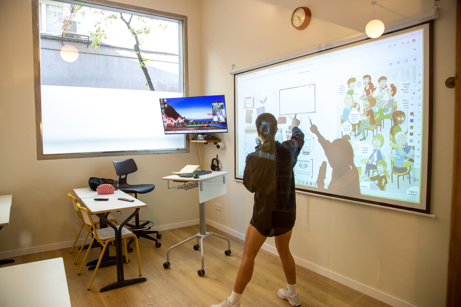 Teacher supporting a student in class